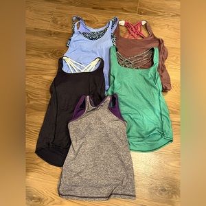 Lot of 5 Lululemon exercise tank tops size 6 in EUC with built in bra